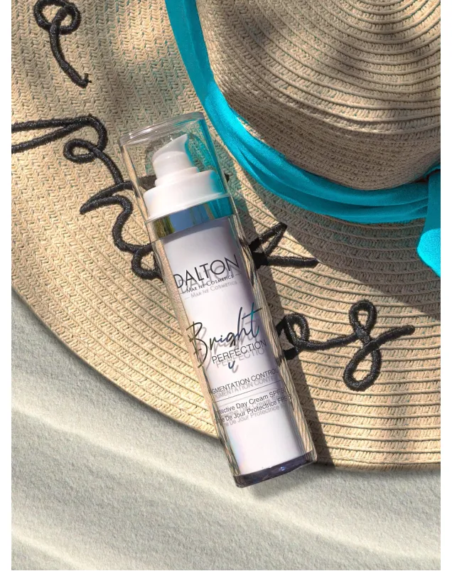 Захисний денний освітлюючий крем проти пігментації SPF 50-2